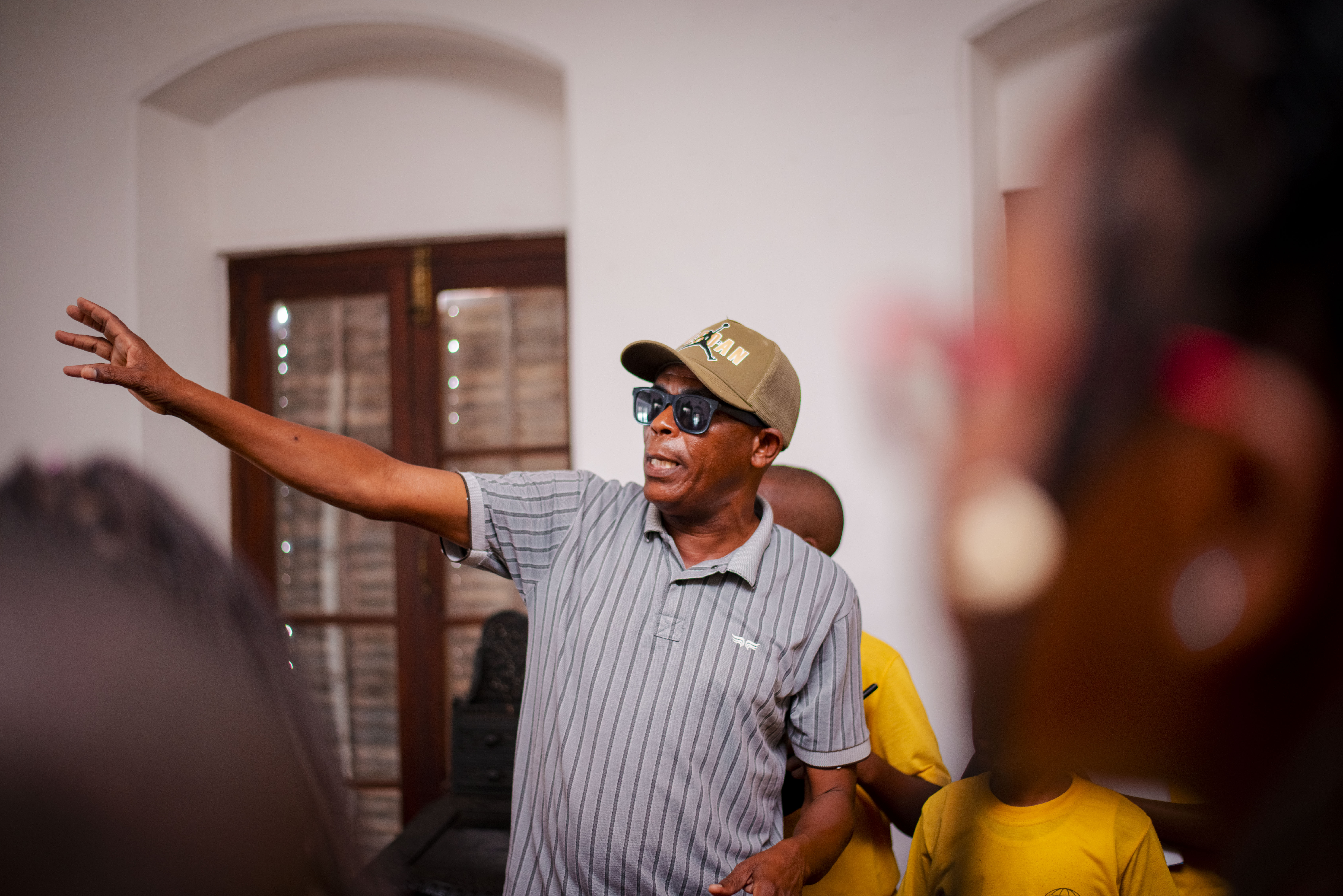 Tour guide explaining history to students